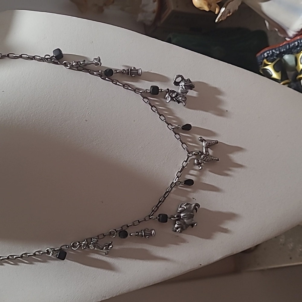 Adorable charm necklace Dogs and fire hydrants silver tone by 3 ladies.